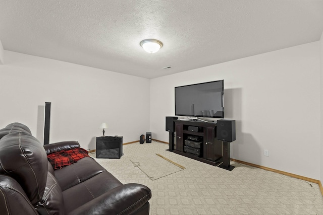 7905 W Seven Mile Rd, Nine Mile Falls, WA 99026 - carpeted living room with baseboards and a textured ceiling