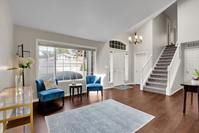 4116 S S Tenfel Ln, Spokane, WA 99223 - foyer with a chandelier, wood finished floors, stairway, and high vaulted ceiling