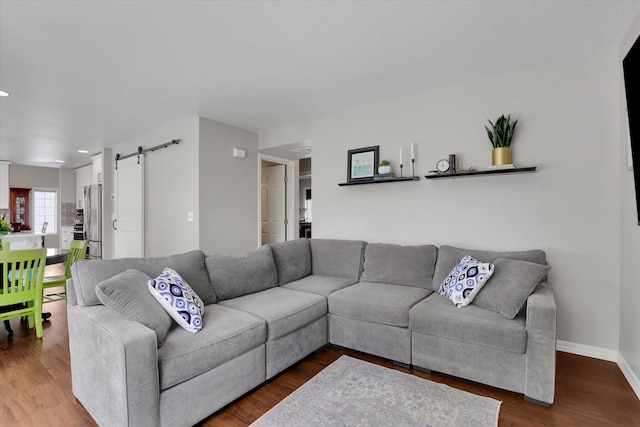 4116 S S Tenfel Ln, Spokane, WA 99223 - living room with a barn door, wood finished floors, and recessed lighting