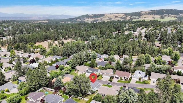 4116 S S Tenfel Ln, Spokane, WA 99223 - aerial view of property's location with a mountainous background and nearby suburban area