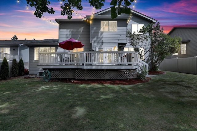 4116 S S Tenfel Ln, Spokane, WA 99223 - back of property at dusk with a deck