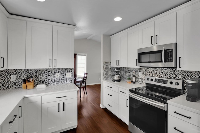 4116 S S Tenfel Ln, Spokane, WA 99223 - kitchen with appliances with stainless steel finishes, recessed lighting, light countertops, white cabinetry, and tasteful backsplash