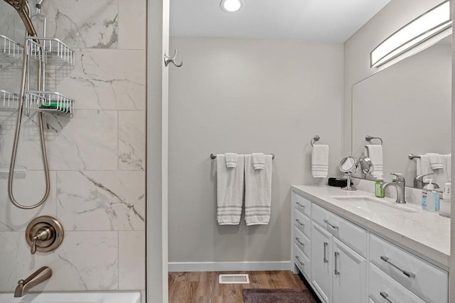 3929 S Best Ct, Veradale, WA 99037 - full bath featuring vanity, bathtub / shower combination, wood finished floors, and recessed lighting