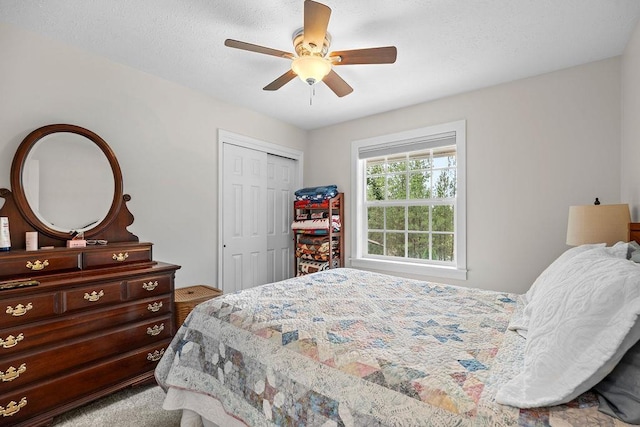 3929 S Best Ct, Veradale, WA 99037 - bedroom featuring a closet, a ceiling fan, and carpet floors