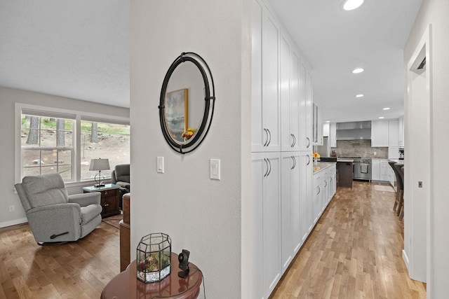 3929 S Best Ct, Veradale, WA 99037 - corridor with light wood finished floors and recessed lighting