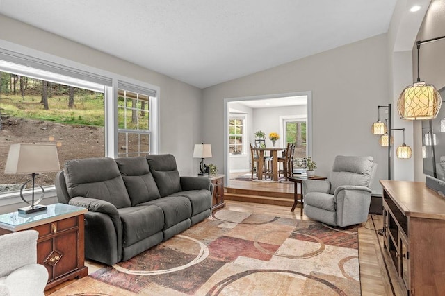 3929 S Best Ct, Veradale, WA 99037 - living room featuring light wood finished floors and lofted ceiling