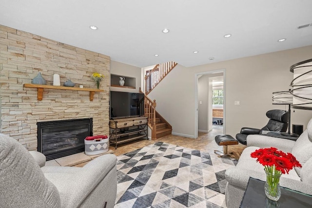 3929 S Best Ct, Veradale, WA 99037 - living area with stairway, recessed lighting, a fireplace, and built in shelves