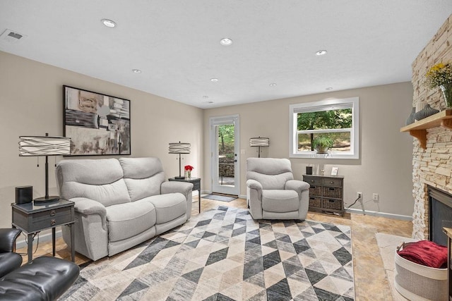 3929 S Best Ct, Veradale, WA 99037 - living room featuring a fireplace, recessed lighting, and light tile patterned flooring