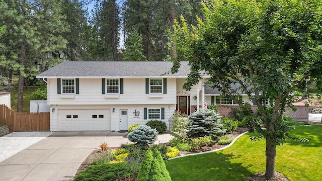 3929 S Best Ct, Veradale, WA 99037 - view of front facade with a garage, concrete driveway, and a shingled roof