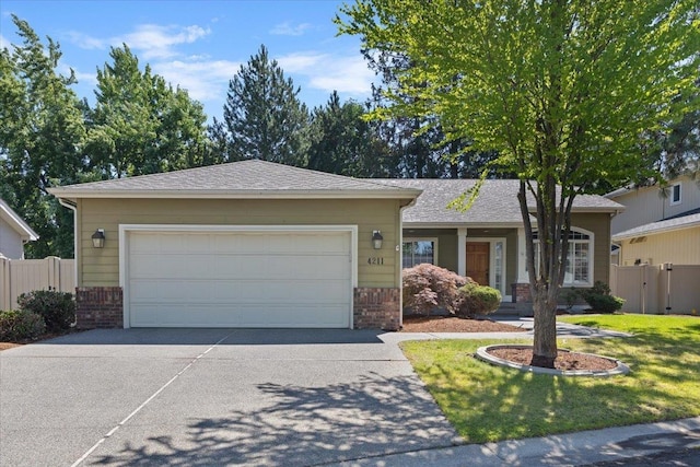 4211 S Greystone Ln Unit 4211, Spokane, WA 99223 - ranch-style house with brick siding, concrete driveway, and a garage