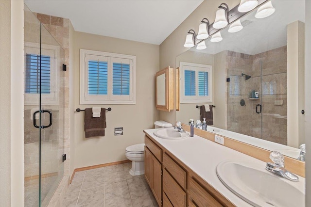 4211 S Greystone Ln Unit 4211, Spokane, WA 99223 - bathroom with a stall shower, double vanity, and tile patterned flooring