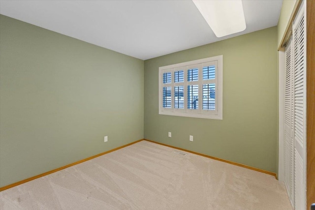 4211 S Greystone Ln Unit 4211, Spokane, WA 99223 - unfurnished bedroom featuring carpet flooring and a closet