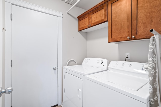 1636 E Vanetta Ln, Spokane, WA 99217 - washroom with washing machine and clothes dryer and cabinet space