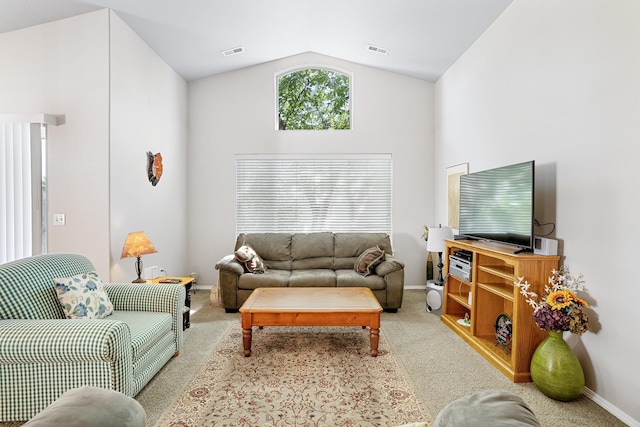 1636 E Vanetta Ln, Spokane, WA 99217 - carpeted living area with lofted ceiling and baseboards