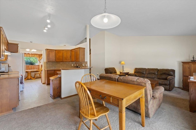 14316 E 31st Ln, Veradale, WA 99037 - dining room with vaulted ceiling and light colored carpet