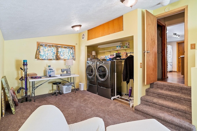 5003 N Normandie St, Spokane, WA 99205 - laundry area featuring separate washer and dryer, carpet floors, and a textured ceiling