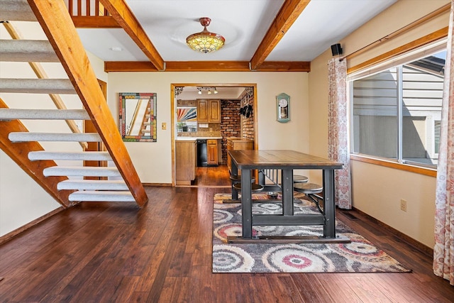 5003 N Normandie St, Spokane, WA 99205 - dining area with beam ceiling, stairway, and dark wood finished floors