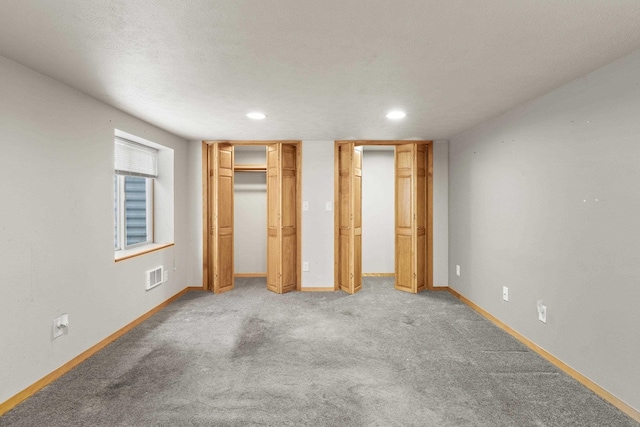 5218 E Commerce Ave, Spokane, WA 99212 - unfurnished bedroom featuring recessed lighting and light carpet