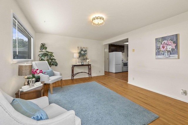 5218 E Commerce Ave, Spokane, WA 99212 - living room with wood finished floors and baseboards