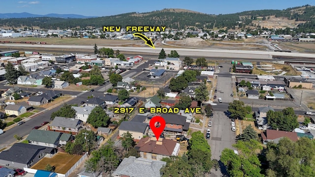 2917 E Broad Ave, Spokane, WA 99217 - aerial view of property's location with mountains and nearby suburban area