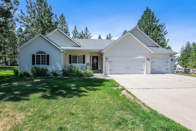 5885 Sandy Court Way, Nine Mile Falls, WA 99026 - ranch-style house with an attached garage, concrete driveway, a front yard, and a shingled roof