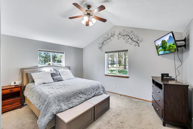 5885 Sandy Court Way, Nine Mile Falls, WA 99026 - bedroom with vaulted ceiling, light colored carpet, and a ceiling fan