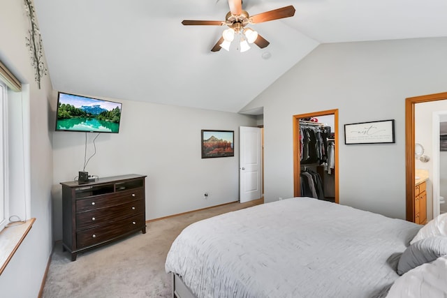 5885 Sandy Court Way, Nine Mile Falls, WA 99026 - bedroom featuring lofted ceiling, light carpet, a walk in closet, ensuite bath, and ceiling fan