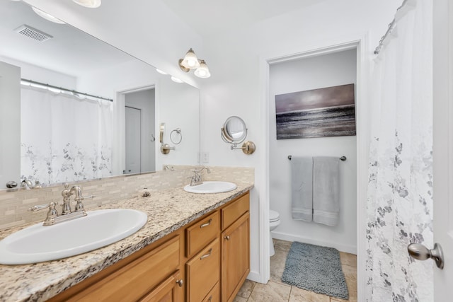 5885 Sandy Court Way, Nine Mile Falls, WA 99026 - bathroom featuring double vanity and tile patterned flooring