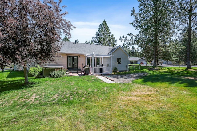 5885 Sandy Court Way, Nine Mile Falls, WA 99026 - rear view of house featuring a hot tub, a deck, and french doors