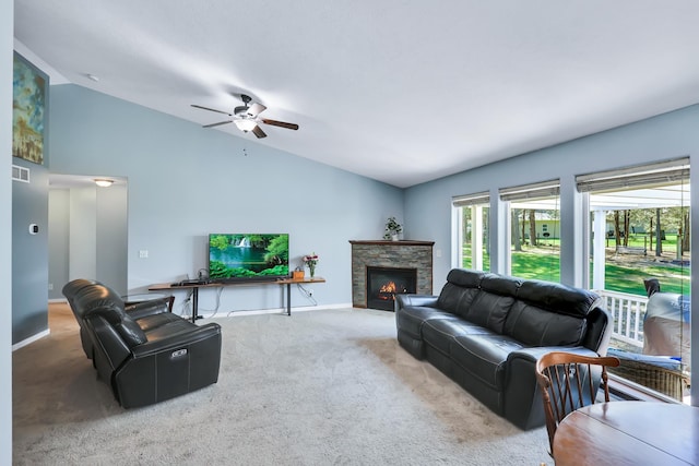 5885 Sandy Court Way, Nine Mile Falls, WA 99026 - carpeted living room with lofted ceiling, a ceiling fan, and a stone fireplace