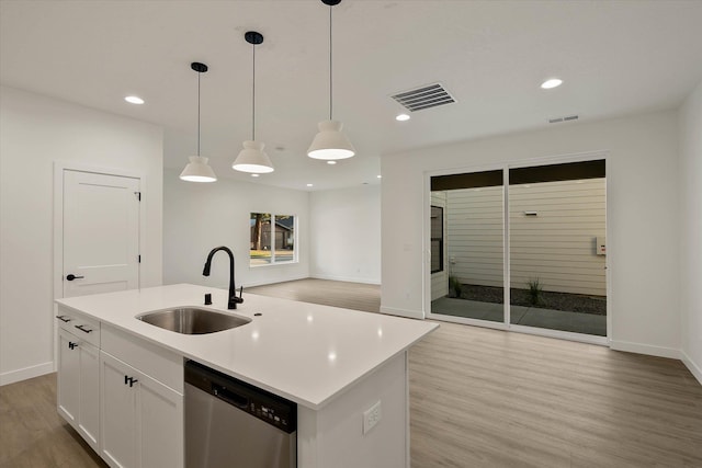 6203 E 13th Ln, Spokane Valley, WA 99212 - kitchen with dishwasher, light wood-style floors, white cabinets, open floor plan, and recessed lighting