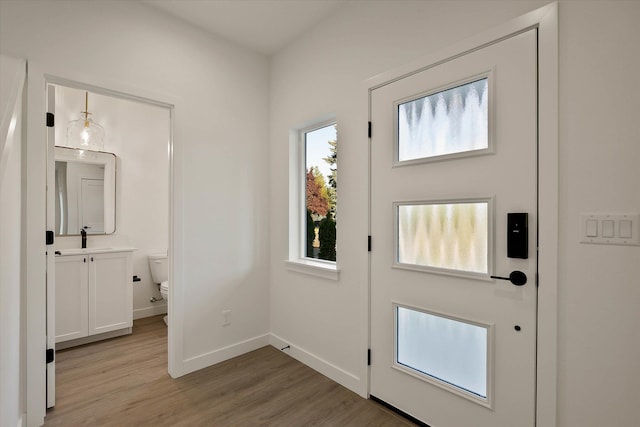 6203 E 13th Ln, Spokane Valley, WA 99212 - entryway featuring light wood-style floors and baseboards