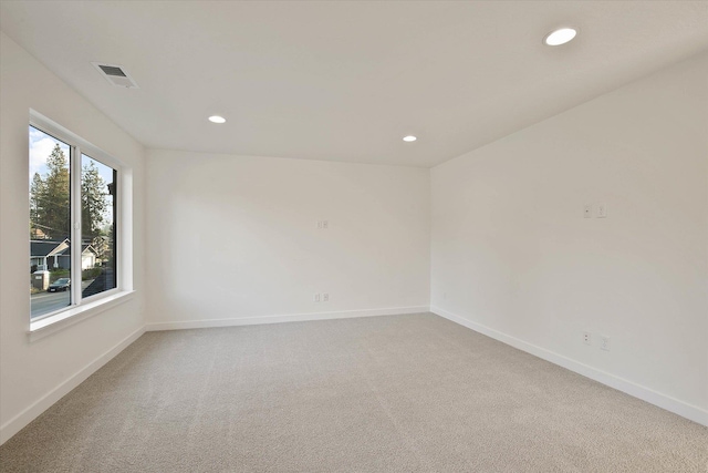 6203 E 13th Ln, Spokane Valley, WA 99212 - spare room featuring recessed lighting and light colored carpet