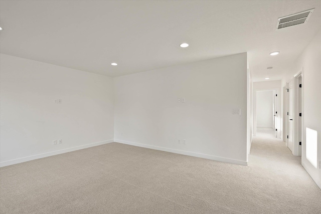 6203 E 13th Ln, Spokane Valley, WA 99212 - spare room featuring light colored carpet and recessed lighting