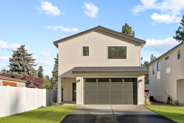 6203 E 13th Ln, Spokane Valley, WA 99212 - modern home with an attached garage and asphalt driveway