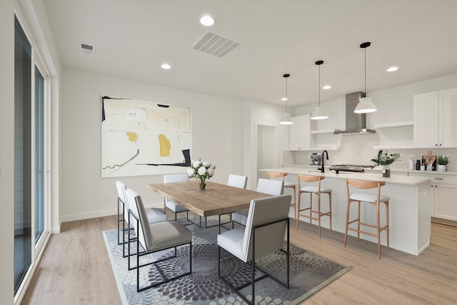 6203 E 13th Ln, Spokane Valley, WA 99212 - dining room featuring light wood-style flooring and recessed lighting