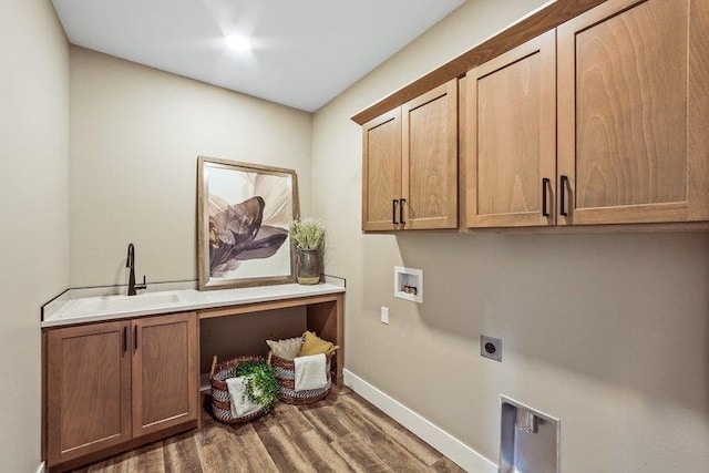 18096 N Morton Ct, Colbert, WA 99005 - laundry room with cabinet space, wood finished floors, hookup for an electric dryer, and washer hookup