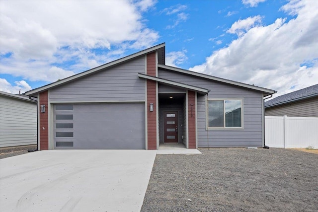 4919 E Grace Ave, Spokane, WA 99217 - view of front of home with an attached garage and driveway