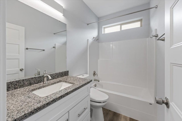 4919 E Grace Ave, Spokane, WA 99217 - bathroom featuring shower / bath combination, vanity, and wood finished floors