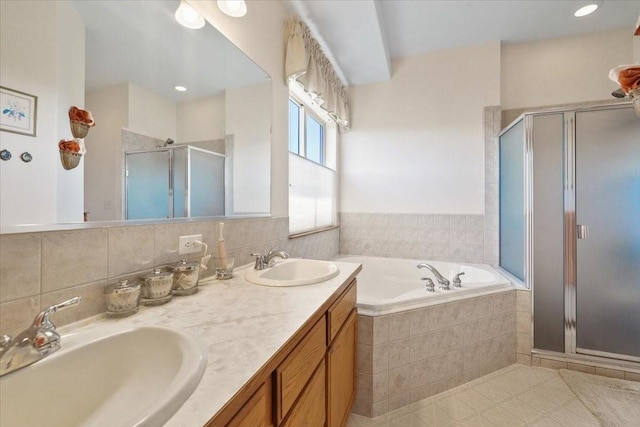 8710 E Sugar Pine Ln, Spokane, WA 99217 - bathroom with a stall shower, a garden tub, double vanity, and tile patterned floors