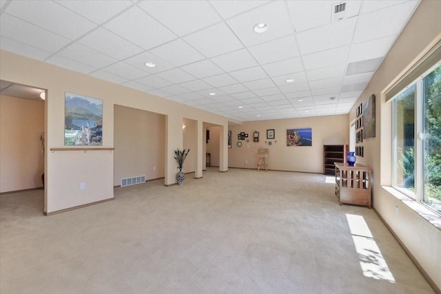 8710 E Sugar Pine Ln, Spokane, WA 99217 - unfurnished living room with carpet, plenty of natural light, a paneled ceiling, and recessed lighting