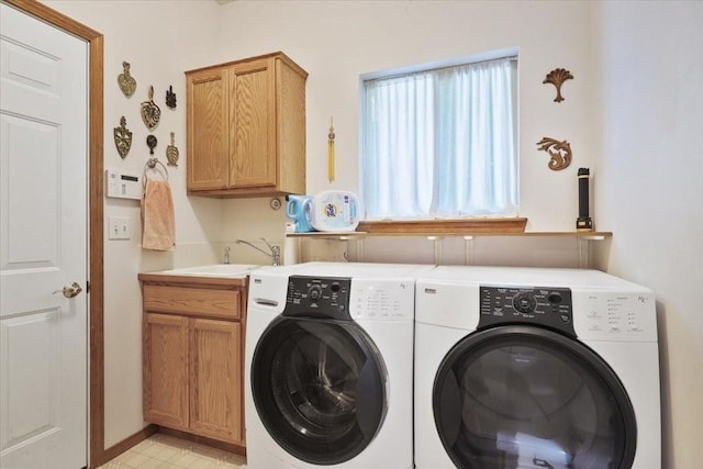 8710 E Sugar Pine Ln, Spokane, WA 99217 - laundry room with washing machine and dryer and cabinet space