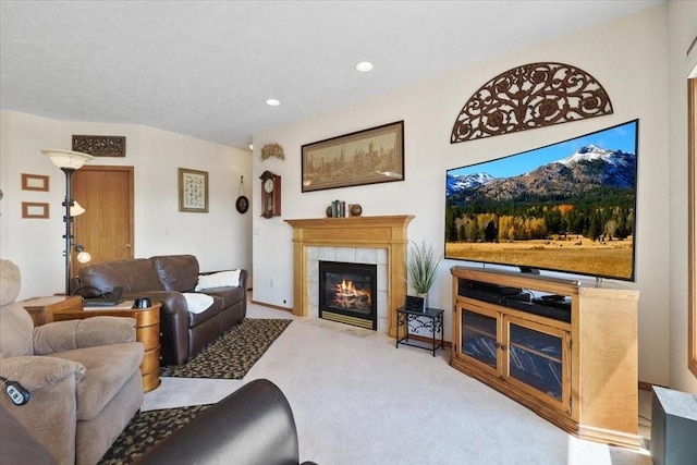 8710 E Sugar Pine Ln, Spokane, WA 99217 - carpeted living area featuring a tiled fireplace and recessed lighting