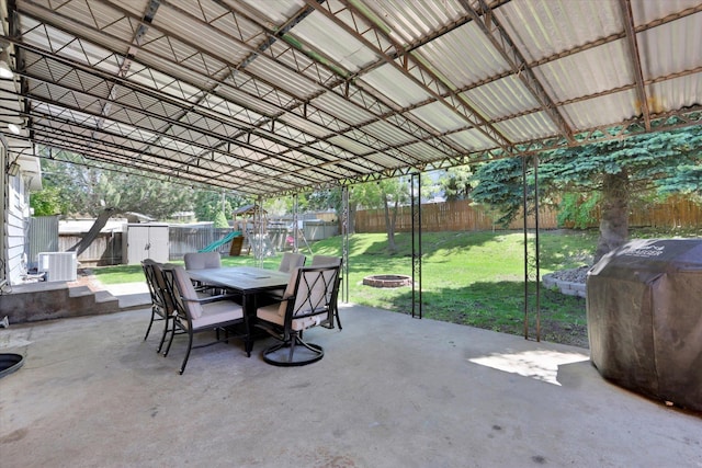 6914 N Jefferson St, Spokane, WA 99208 - fenced backyard with a storage shed, a patio area, grilling area, and outdoor dining space