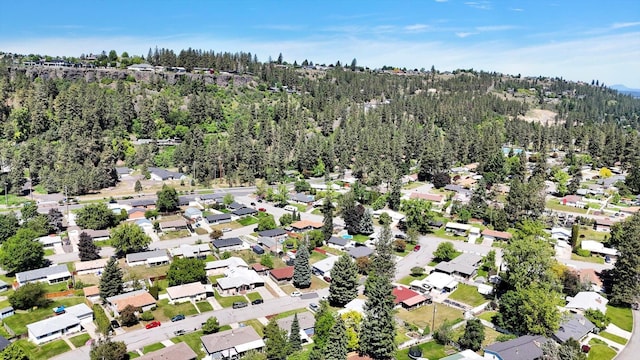 6914 N Jefferson St, Spokane, WA 99208 - aerial overview of property's location featuring a forest and nearby suburban area