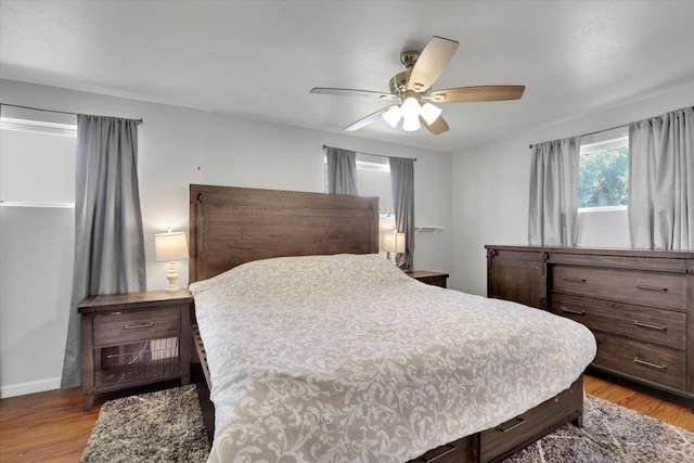 6914 N Jefferson St, Spokane, WA 99208 - bedroom with wood finished floors and ceiling fan