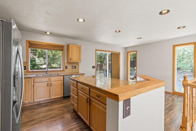 8603 E Columbia Park Dr, Spokane Valley, WA 99212 - kitchen featuring stainless steel appliances, healthy amount of natural light, dark wood finished floors, and recessed lighting