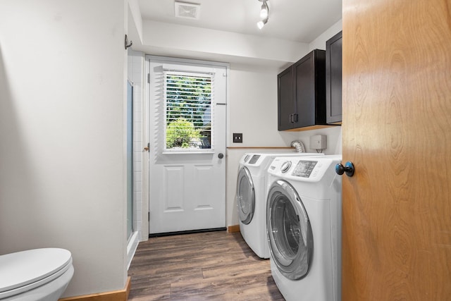 8603 E Columbia Park Dr, Spokane Valley, WA 99212 - laundry area featuring washing machine and dryer and dark wood finished floors