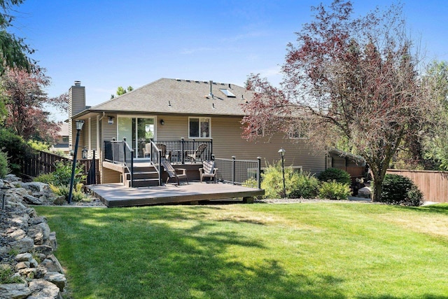 8603 E Columbia Park Dr, Spokane Valley, WA 99212 - rear view of house with a chimney, a deck, and a shingled roof