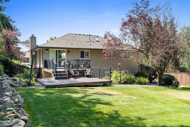 8603 E Columbia Park Dr, Spokane Valley, WA 99212 - back of house featuring a chimney, a wooden deck, and roof with shingles